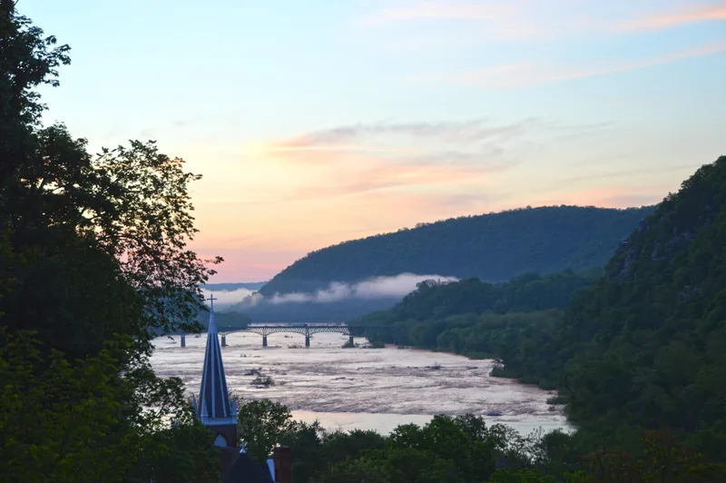 The view across wooded hills and the river from Jefferson Rock in Harpers Ferry.